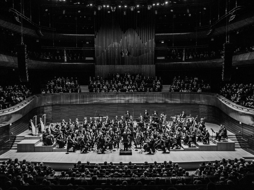 orchestra and conductor on stage at the NOSPR concert hall